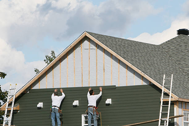 Professional Emergency Siding Repair technician working in Follansbee, WV